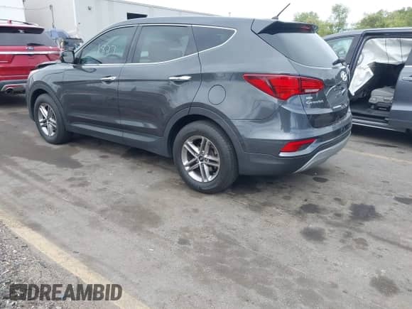 2018 Hyundai Santa Fe 2.4L with VIN 5XYZT3LB7JG562034, listed as a IAAI auction lot 43175229 with 93,961 mi miles and . Bid and sale history available at DreamBid. Image 3.