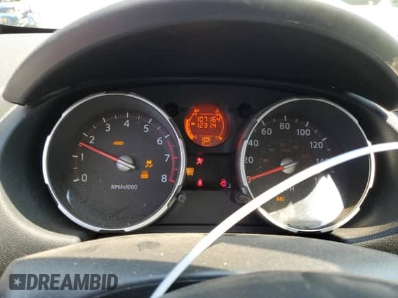 2010 Nissan Rogue S with VIN JN8AS5MV7AW114422, listed as a Copart auction lot 71532215 with 107,164 mi miles and Salvage title. Bid and sale history available at DreamBid. Image 9.