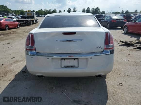 2012 Chrysler 300 C Luxury Series с VIN 2C3CCAPT1CH227776, выставлен на аукционе Copart как лот 61947785 с пробегом 197 737 миль миль и Списание • Salvage title. История ставок и продаж доступна на DreamBid. Изображение 6.
