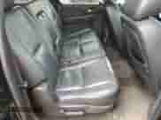 2011 Chevrolet Suburban LS with VIN 1GNSKHE36BR382223, listed as a Copart auction lot 64559285 with 140,819 mi miles and Salvage title. Bid and sale history available at DreamBid. Image 11.