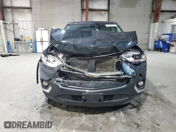 2020 Chevrolet Traverse LT с VIN 1GNEVHKW0LJ215780, выставлен на аукционе Copart как лот 71681455 с пробегом 96 838 миль миль и Списание • Salvage title. История ставок и продаж доступна на DreamBid. Изображение 5.