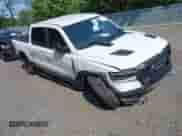2019 Ram 1500 Rebel z VIN 1C6SRFLT1KN743349, wystawiony jako IAAI lot #42841318 z przebiegiem 144 144 mil mil oraz . Historia ofert i sprzedaży dostępna na DreamBid. Obrazek 1.