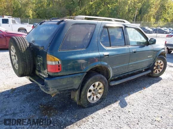 1998 Honda Passport LX z VIN 4S6CM58W2W4404123, wystawiony jako IAAI lot #43346823 z przebiegiem 167 991 mil mil oraz . Historia ofert i sprzedaży dostępna na DreamBid. Obrazek 4.