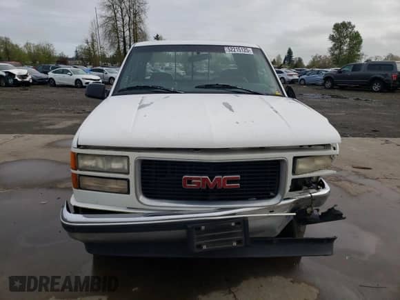 1997 GMC Sierra 1500 z VIN 2GTEC19R8V1523041, wystawiony jako Copart lot #52215125 z przebiegiem 207 461 mil mil oraz Szkoda całkowita • Salvage title. Historia ofert i sprzedaży dostępna na DreamBid. Obrazek 5.