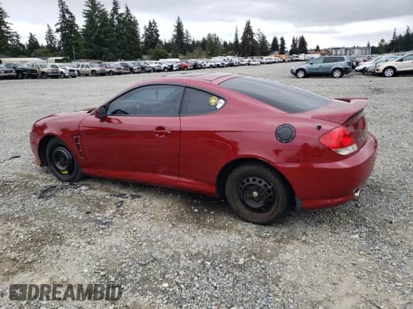 2006 Hyundai Tiburon GT с VIN KMHHN65FX6U228735, выставлен на аукционе Copart как лот 71986204 с пробегом 179 943 миль миль и Списание • Salvage title. История ставок и продаж доступна на DreamBid. Изображение 2.