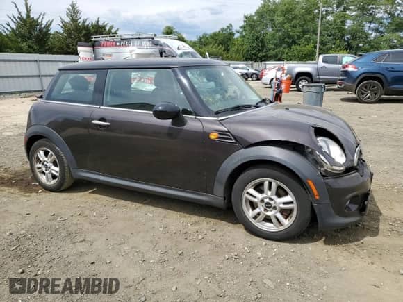 2013 MINI Hardtop with VIN WMWSU3C58DT685565, listed as a Copart auction lot 70710745 with 87,237 mi miles and Salvage title. Bid and sale history available at DreamBid. Image 4.