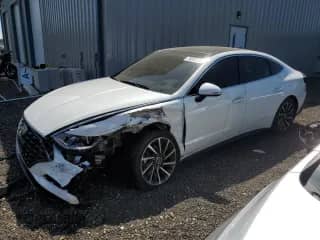 2022 Hyundai Sonata Limited с VIN KMHL34J27NA232586, выставлен на аукционе Copart как лот 70883425 с пробегом 100 997 миль миль и Списание • Salvage title. История ставок и продаж доступна на DreamBid. Изображение 1.