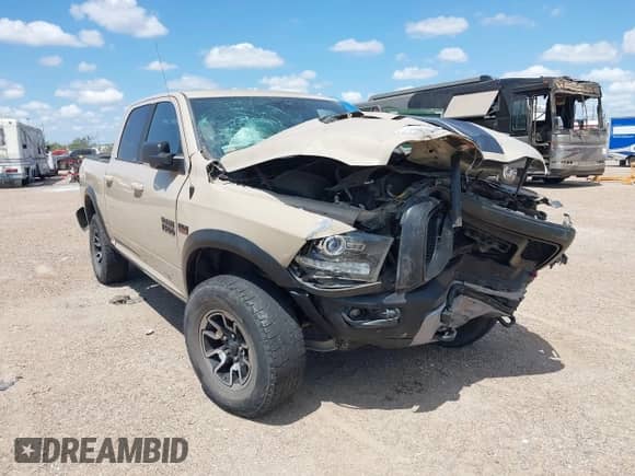 2017 Ram 1500 Rebel z VIN 1C6RR7YT8HS619828, wystawiony jako IAAI lot #42873979 z przebiegiem 136 471 mil mil oraz . Historia ofert i sprzedaży dostępna na DreamBid. Obrazek 1.