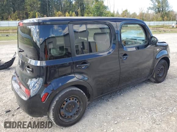 2010 Nissan Cube S with VIN JN8AZ2KR3AT170729, listed as a Copart auction lot 82282885 with 97,111 mi miles and Salvage title. Bid and sale history available at DreamBid. Image 3.