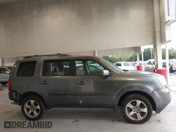 2014 Honda Pilot EX with VIN 5FNYF3H48EB013310, listed as a IAAI auction lot 43411367 with 134,710 mi miles and . Bid and sale history available at DreamBid. Image 14.