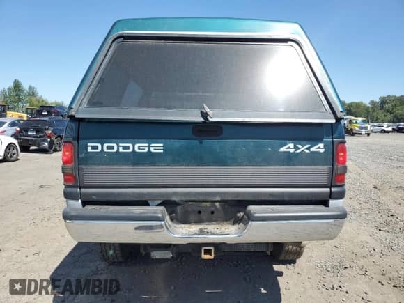 1998 Dodge RAM with VIN 3B7KF26D9WM220885, listed as a Copart auction lot 63468695 with 102,002 mi miles and Salvage title. Bid and sale history available at DreamBid. Image 6.