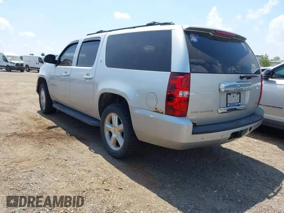 2010 Chevrolet Suburban LT with VIN 1GNUKJE39AR134756, listed as a IAAI auction lot 42824041 with Not provided miles and . Bid and sale history available at DreamBid. Image 3.