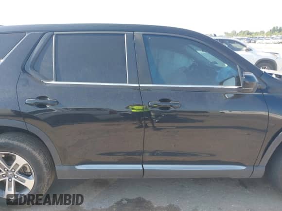 2024 Honda Pilot EX-L z VIN 5FNYG2H53RB002351, wystawiony jako IAAI lot #42982438 z przebiegiem Nie podano mil oraz . Historia ofert i sprzedaży dostępna na DreamBid. Obrazek 13.