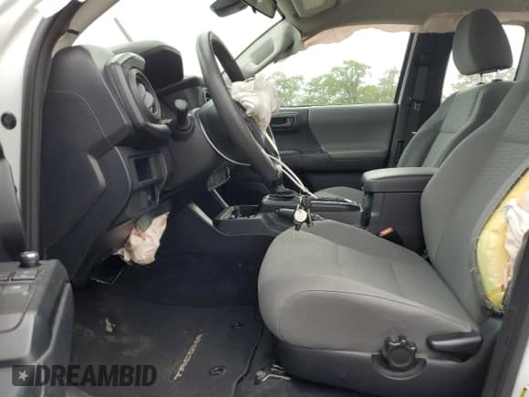 2018 Toyota Tacoma SR with VIN 5TFSX5EN0JX059578, listed as a Copart auction lot 84287615 with 68,235 mi miles and Salvage title. Bid and sale history available at DreamBid. Image 7.