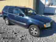 2006 Jeep Grand Cherokee Laredo with VIN 1J4HR48N86C194486, listed as a Copart auction lot 86637195 with 127,284 mi miles and Salvage title. Bid and sale history available at DreamBid. Image 4.