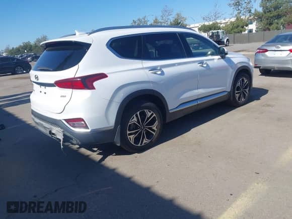 2019 Hyundai Santa Fe Ultimate с VIN 5NMS53AA7KH127298, выставлен на аукционе IAAI как лот 42213835 с пробегом 102 806 миль миль и . История ставок и продаж доступна на DreamBid. Изображение 4.