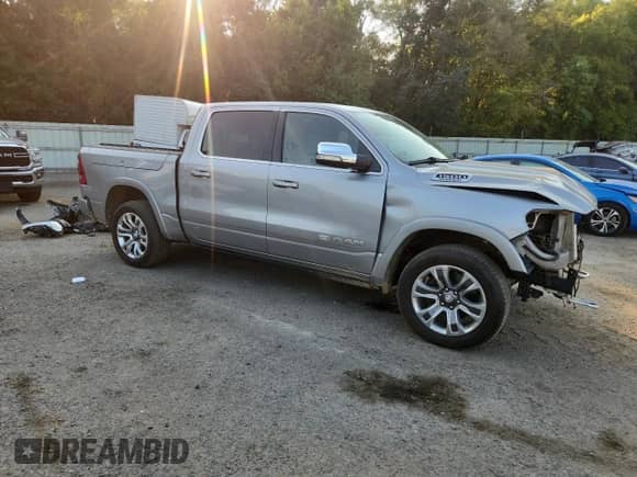 2020 Ram 1500 Longhorn with VIN 1C6SRFKT0LN388709, listed as a Copart auction lot 81114635 with 82,592 mi miles and Salvage title. Bid and sale history available at DreamBid. Image 4.