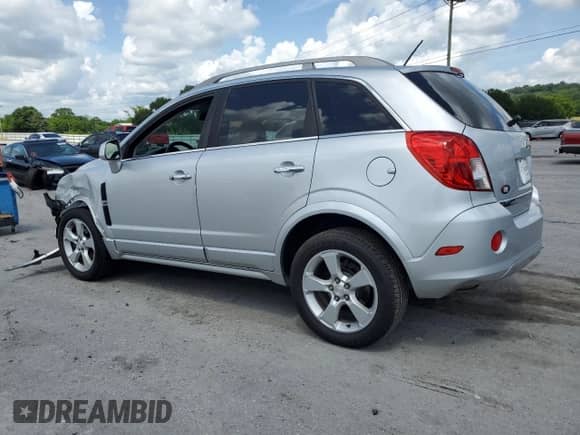 2015 Chevrolet Captiva Sport LT with VIN 3GNAL3EK7FS517800, listed as a Copart auction lot 60931915 with 102,260 mi miles and Salvage title. Bid and sale history available at DreamBid. Image 2.