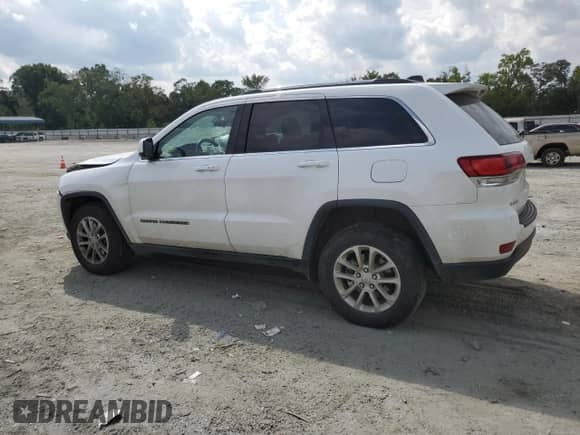 2021 Jeep Grand Cherokee Laredo E with VIN 1C4RJFAG9MC731727, listed as a Copart auction lot 69651455 with 33,180 mi miles and Salvage title. Bid and sale history available at DreamBid. Image 2.