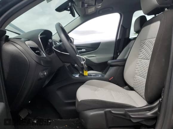 2018 Chevrolet Equinox LS with VIN 3GNAXREV1JS588873, listed as a Copart auction lot 71904665 with 63,602 mi miles and Salvage title. Bid and sale history available at DreamBid. Image 7.