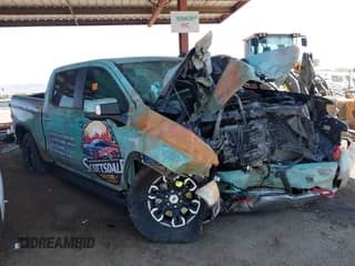 2023 Chevrolet Silverado 1500 ZR2 z VIN 3GCUDHEL1PG177864, wystawiony jako IAAI lot #42454141 z przebiegiem Nie podano mil oraz . Historia ofert i sprzedaży dostępna na DreamBid. Obrazek 1.