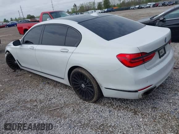 2019 BMW 7 Series 740i xDrive with VIN WBA7E4C54KGV28548, listed as a IAAI auction lot 42130093 with 92,126 mi miles and . Bid and sale history available at DreamBid. Image 3.