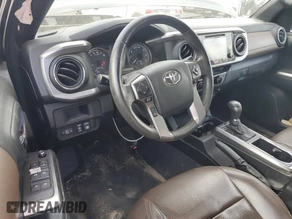2017 Toyota Tacoma Limited with VIN 3TMGZ5AN1HM047851, listed as a Copart auction lot 82239165 with 127,129 mi miles and Clean title. Bid and sale history available at DreamBid. Image 8.