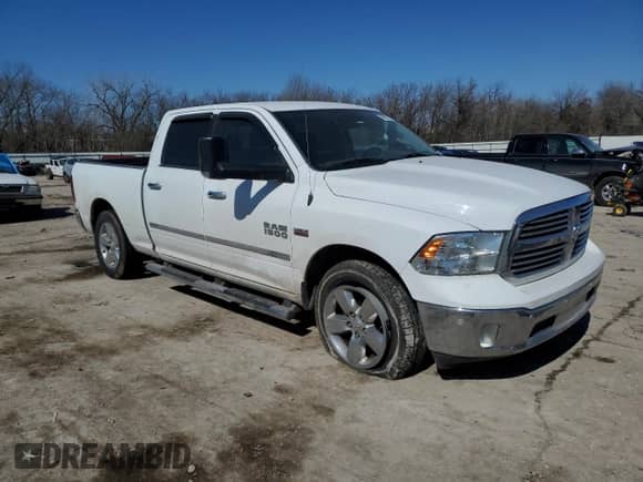 2015 Ram 1500 Big Horn with VIN 1C6RR7TT1FS761488, listed as a Copart auction lot 45939775 with 99,900 mi miles and Salvage title. Bid and sale history available at DreamBid. Image 4.
