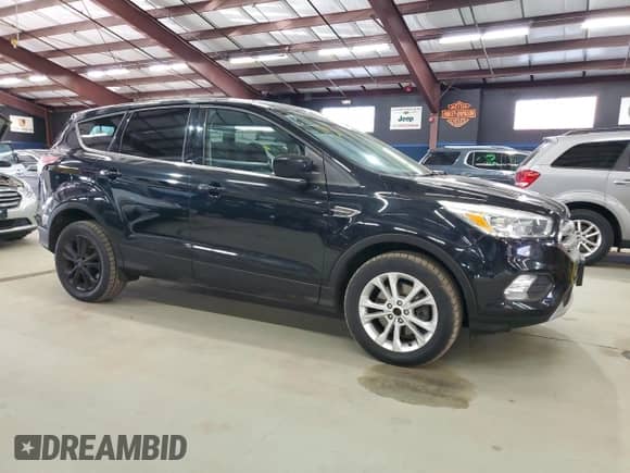 2017 Ford Escape SE with VIN 1FMCU9G98HUB97980, listed as a Copart auction lot 90439195 with 156,873 mi miles and Clean title. Bid and sale history available at DreamBid. Image 4.