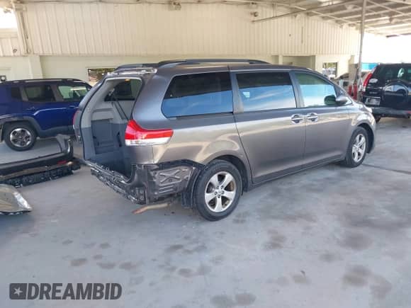 2012 Toyota Sienna LE AAS with VIN 5TDKK3DC6CS193748, listed as a IAAI auction lot 43190621 with 197,152 mi miles and . Bid and sale history available at DreamBid. Image 4.