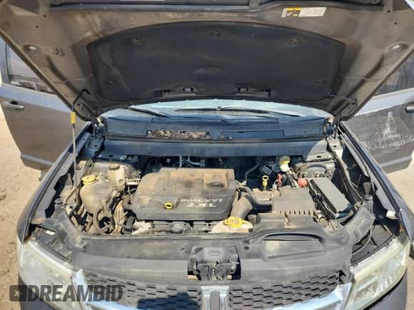 2015 Dodge Journey SXT with VIN 3C4PDCBB4FT655017, listed as a Copart auction lot 81322195 with 122,679 mi miles and Salvage title. Bid and sale history available at DreamBid. Image 12.