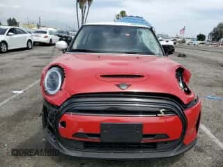 2024 MINI Hardtop Cooper SE with VIN WMW13DJ04R2V85696, listed as a Copart auction lot 56584005 with 4,967 mi miles and Salvage title. Bid and sale history available at DreamBid. Image 5.