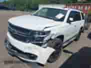 2015 Chevrolet Tahoe LT with VIN 1GNSKBKC1FR175813, listed as a IAAI auction lot 43113210 with 165,599 mi miles and . Bid and sale history available at DreamBid. Image 2.