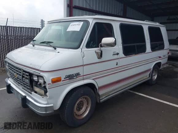 1994 Chevrolet Chevy Van with VIN 1GBEG25K1RF184239, listed as a IAAI auction lot 43451541 with 144,790 mi miles and . Bid and sale history available at DreamBid. Image 2.