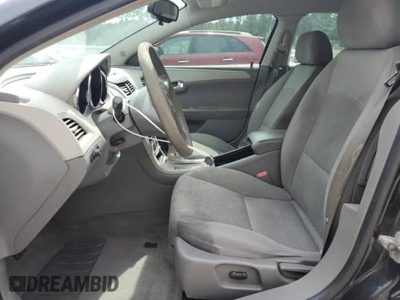 2009 Chevrolet Malibu 1FL with VIN 1G1ZG57B59F219787, listed as a Copart auction lot 71179395 with 168,757 mi miles and Salvage title. Bid and sale history available at DreamBid. Image 7.