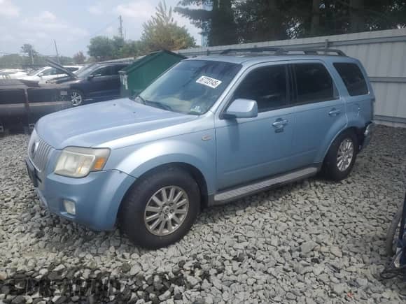 2008 Mercury Mariner Premier with VIN 4M2CU97138KJ12158, listed as a Copart auction lot 67723145 with 132,629 mi miles and Salvage title. Bid and sale history available at DreamBid. Image 1.