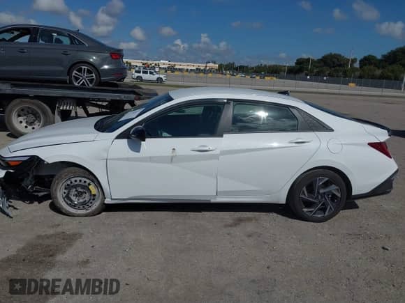 2025 Hyundai Elantra Blue with VIN KMHLM4DJ0SU123350, listed as a IAAI auction lot 41536867 with 6,077 mi miles and . Bid and sale history available at DreamBid. Image 15.