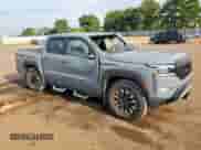 2023 Nissan Frontier Pro-X with VIN 1N6ED1EJ9PN667015, listed as a Copart auction lot 80789655 with 21,193 mi miles and Salvage title. Bid and sale history available at DreamBid. Image 4.