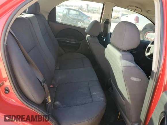 2006 Chevrolet Aveo LS z VIN KL1TD56696B662643, wystawiony jako Copart lot #82846974 z przebiegiem 169 780 mil mil oraz Czysty tytuł • Clean title. Historia ofert i sprzedaży dostępna na DreamBid. Obrazek 10.