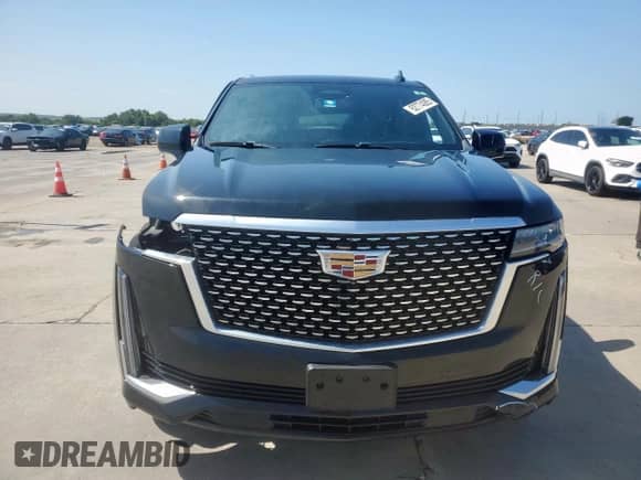 2023 Cadillac Escalade with VIN 1GYS4JKT2PR397110, listed as a Copart auction lot 62774085 with 138,328 mi miles and Clean title. Bid and sale history available at DreamBid. Image 5.