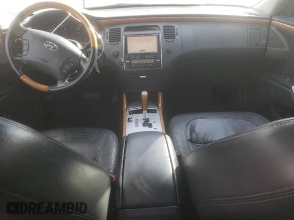 2008 Hyundai Azera Limited с VIN KMHFC46F58A318430, выставлен на аукционе Copart как лот 78390144 с пробегом 230 816 миль миль и Списание • Salvage title. История ставок и продаж доступна на DreamBid. Изображение 8.