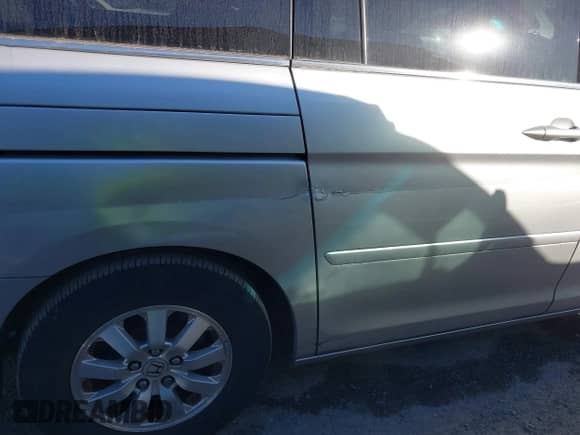 2008 Honda Odyssey EX z VIN 5FNRL38438B068846, wystawiony jako IAAI lot #43451580 z przebiegiem 185 466 mil mil oraz . Historia ofert i sprzedaży dostępna na DreamBid. Obrazek 15.