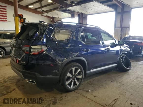 2024 Honda Pilot Touring with VIN 5FNYG1H78RB043666, listed as a Copart auction lot 64004205 with 18,734 mi miles and Salvage title. Bid and sale history available at DreamBid. Image 3.