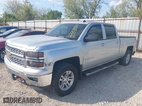 2014 Chevrolet Silverado 1500 LT with VIN 3GCUKREC0EG343333, listed as a IAAI auction lot 43328983 with 143,254 mi miles and . Bid and sale history available at DreamBid. Image 2.