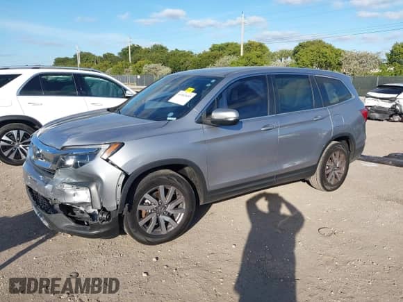 2020 Honda Pilot EX z VIN 5FNYF5H39LB019780, wystawiony jako IAAI lot #41063655 z przebiegiem 148 023 mil mil oraz . Historia ofert i sprzedaży dostępna na DreamBid. Obrazek 17.