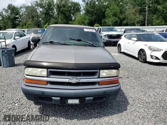 2003 Chevrolet S-10 with VIN 1GCCS14H638288223, listed as a Copart auction lot 71243395 with 132,097 mi miles and Salvage title. Bid and sale history available at DreamBid. Image 13.