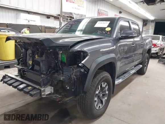 2019 Toyota Tacoma TRD Off Road with VIN 3TMCZ5AN2KM194198, listed as a IAAI auction lot 43463635 with 48,375 mi miles and . Bid and sale history available at DreamBid. Image 2.