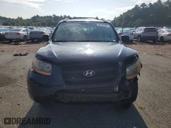2009 Hyundai Santa Fe GLS z VIN 5NMSG73D89H239529, wystawiony jako Copart lot #66722535 z przebiegiem 186 962 mil mil oraz Szkoda całkowita • Salvage title. Historia ofert i sprzedaży dostępna na DreamBid. Obrazek 5.