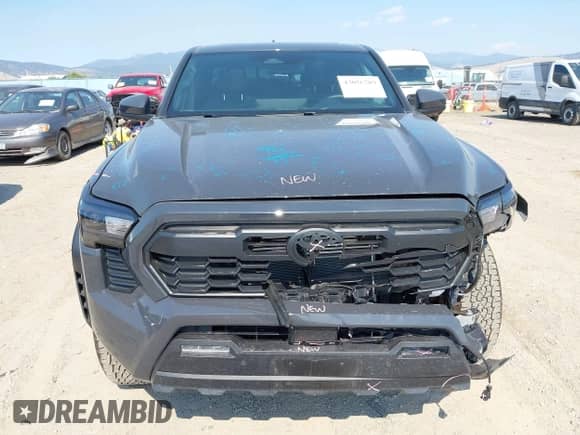 2024 Toyota Tacoma TRD Off Road with VIN 3TMLB5JN7RM069938, listed as a IAAI auction lot 43056789 with 6,837 mi miles and . Bid and sale history available at DreamBid. Image 12.