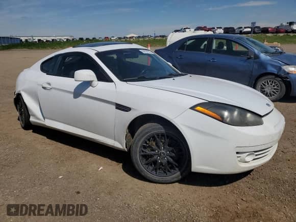 2008 Hyundai Tiburon GS с VIN KMHHM65D88U276240, выставлен на аукционе Copart как лот 68894235 с пробегом 220 049 миль миль и Списание • Salvage title. История ставок и продаж доступна на DreamBid. Изображение 4.